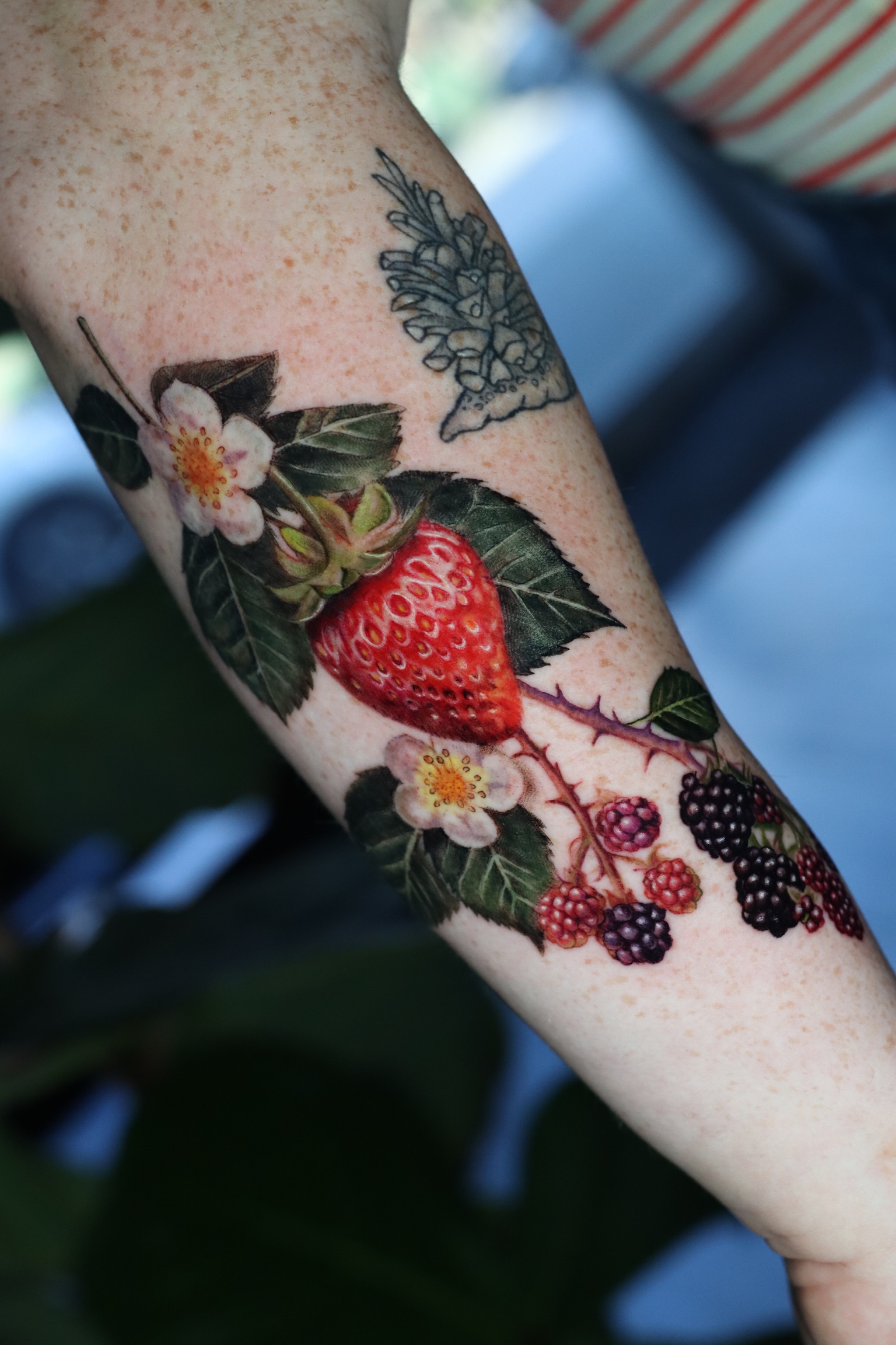 Botanical strawberry and blackberry tattoo by Naomi Burke